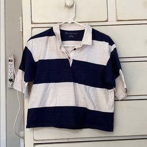 blue and white striped polo shirt